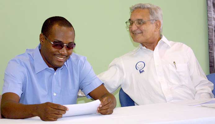 Clive Pantin with star batsman Brian Lara, a past student of Fatima College. Clive Pantin with star batsman Brian Lara, a past student of Fatima College.