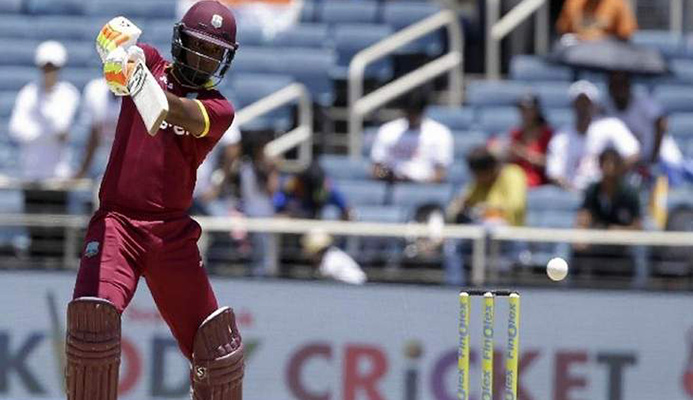 Bang!: West Indies opening batsman Evin Lewis smacks another delivery during his Man-of-the-Match 125 not out against India in their one-off T20 International at Sabina Park in Kingston, Jamaica, yesterday. West Indies won by nine wickets. —Photo: AP Bang!: West Indies opening batsman Evin Lewis smacks another delivery during his Man-of-the-Match 125 not out against India in their one-off T20 International at Sabina Park in Kingston, Jamaica, yesterday. West Indies won by nine wickets. —Photo: AP