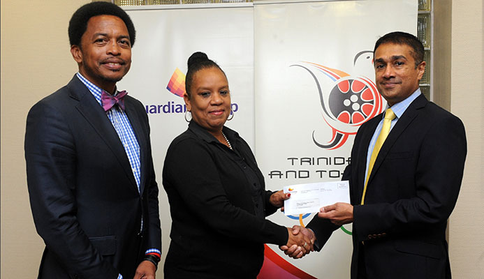 In photo: TTOC President, Brian Lewis and TTOC Secretary General, Mrs. Annette Knott was presented with a cheque from Group CEO, Ravi Tewari, to aid #10golds24 Athlete Welfare and Preparation Fund. Brian Lewis, TTOC President, expressed his gratitude to Guardian Group and commended their long standing partnership in the work of the TTOC. In photo: TTOC President, Brian Lewis and TTOC Secretary General, Mrs. Annette Knott was presented with a cheque from Group CEO, Ravi Tewari, to aid #10golds24 Athlete Welfare and Preparation Fund. Brian Lewis, TTOC President, expressed his gratitude to Guardian Group and commended their long standing partnership in the work of the TTOC.