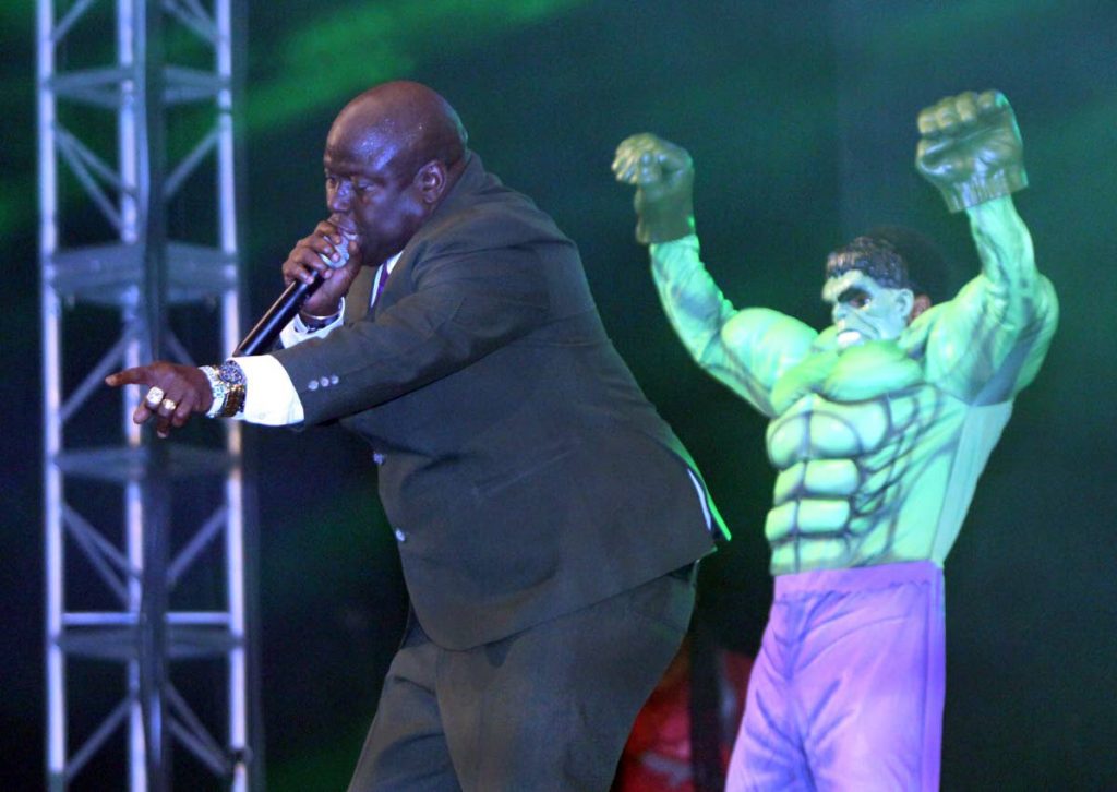 Hulk power: Hulk flexes his muscles as Dexter "Blaxx" Stewart sings of the power of inner strength during his second place performance at the International Soca Monarch final, Queen's Park Savannah, Port of Spain on Friday night. Photos by Angelo Marcelle Hulk power: Hulk flexes his muscles as Dexter "Blaxx" Stewart sings of the power of inner strength during his second place performance at the International Soca Monarch final, Queen's Park Savannah, Port of Spain on Friday night. Photos by Angelo Marcelle