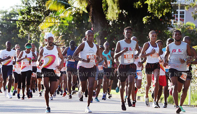 Runners take off in the Guardian Group SHINE Charity 5K and 10K yesterday at the Nelson Mandela Park, St Clair. Runners take off in the Guardian Group SHINE Charity 5K and 10K yesterday at the Nelson Mandela Park, St Clair.