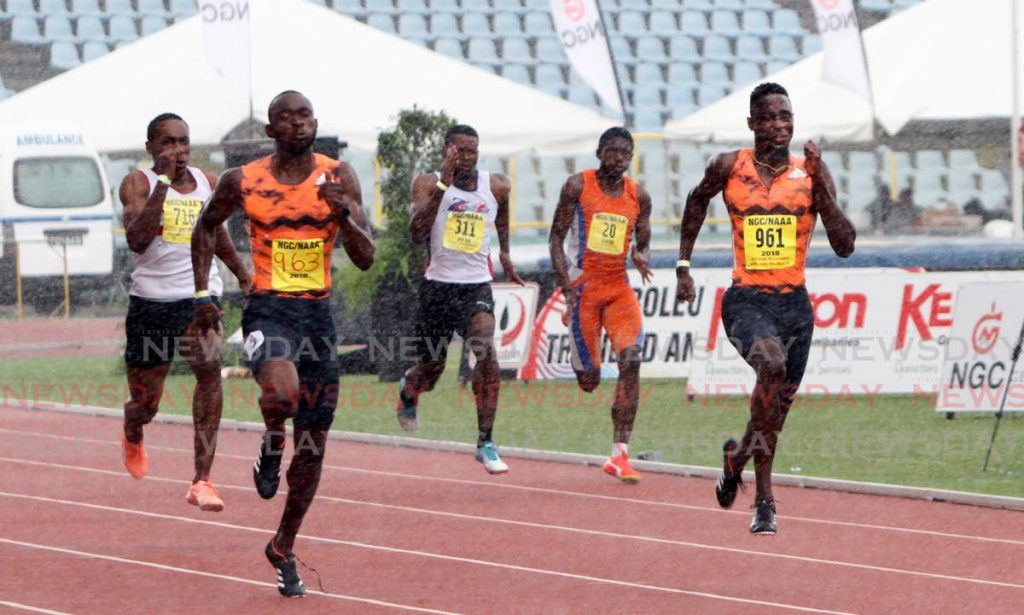 In this June 24, 2018 file photo, Kyle Greaux (second left), outpaces clubmate Jereem Richards (right), to win the Men's 200-metre final, at the NGC/Sagicor/NAAA National Open Championships, held at the Hasely Crawford Stadium, Mucurapo. Photo by Sureash Cholai. - CHOLAI In this June 24, 2018 file photo, Kyle Greaux (second left), outpaces clubmate Jereem Richards (right), to win the Men's 200-metre final, at the NGC/Sagicor/NAAA National Open Championships, held at the Hasely Crawford Stadium, Mucurapo. Photo by Sureash Cholai. - CHOLAI