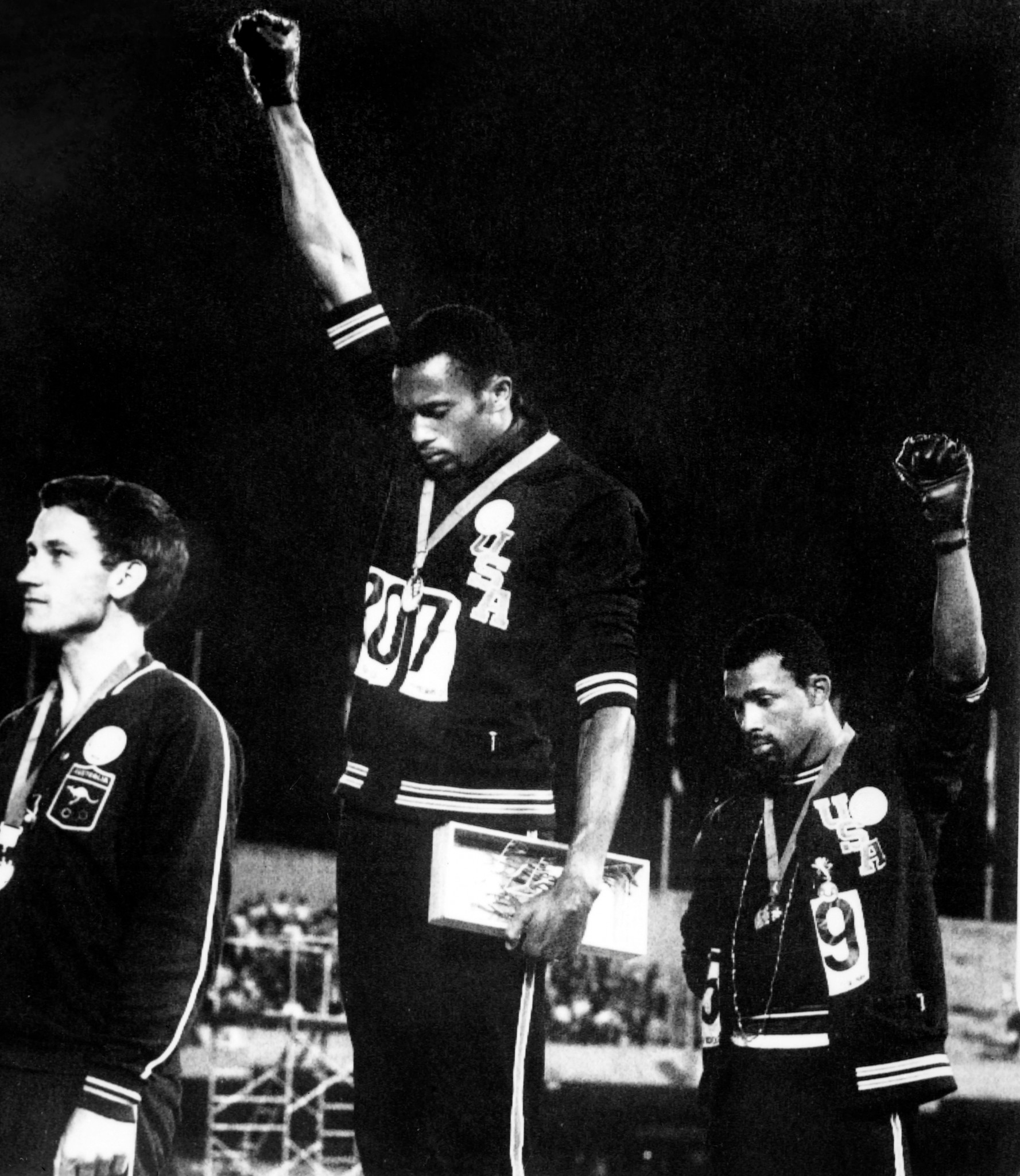 When Tommie Smith and John Carlos raised their fists in protest at the 1968 Summer Games, Australian runner Peter Norman stood by them. It lost him his career. When Tommie Smith and John Carlos raised their fists in protest at the 1968 Summer Games, Australian runner Peter Norman stood by them. It lost him his career.