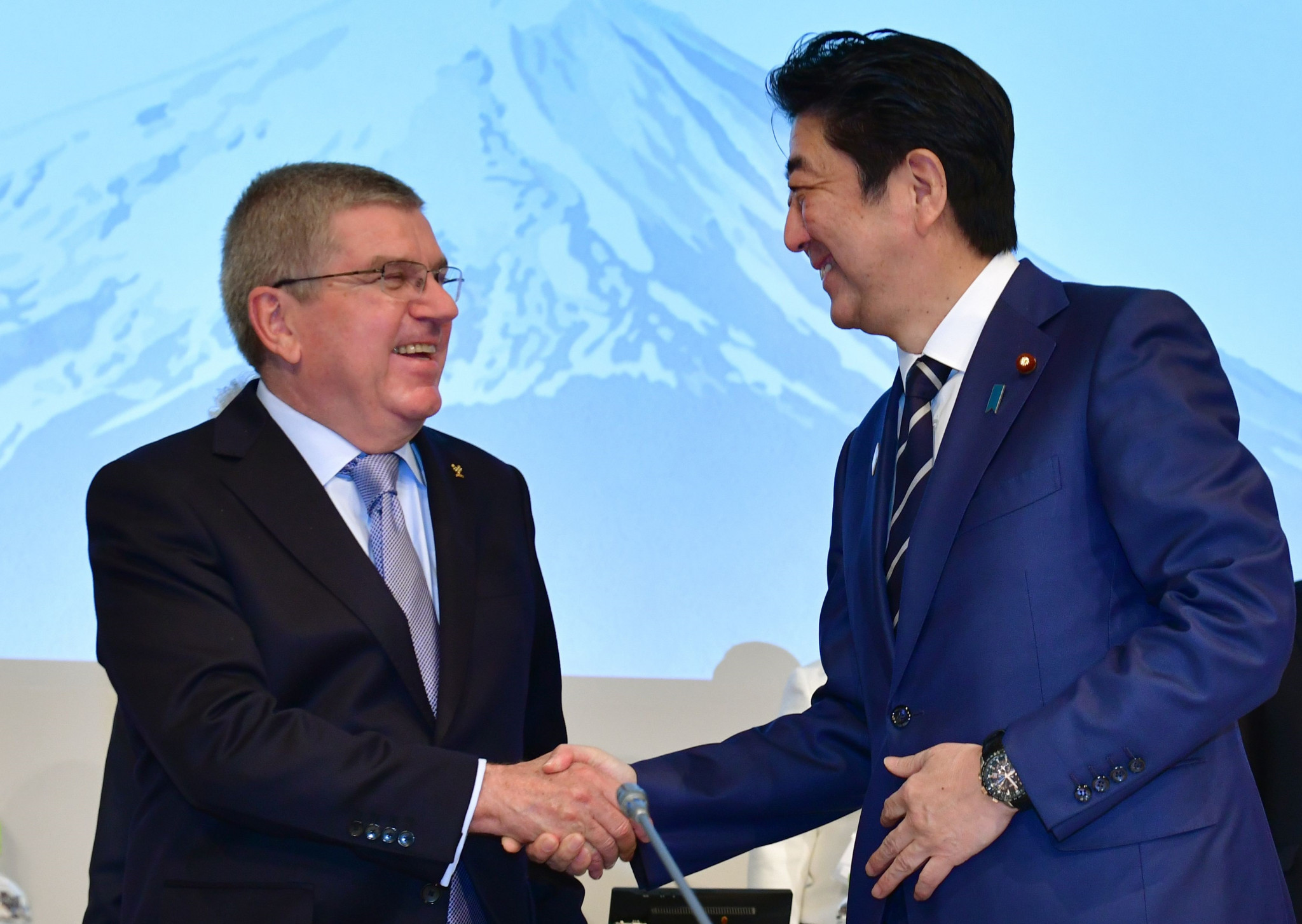 Japanese Prime Minister Shinzō Abe and IOC President Thomas Bach have agreed to a one-year postponement of Tokyo 2020 ©Getty Images Japanese Prime Minister Shinzō Abe and IOC President Thomas Bach have agreed to a one-year postponement of Tokyo 2020 ©Getty Images