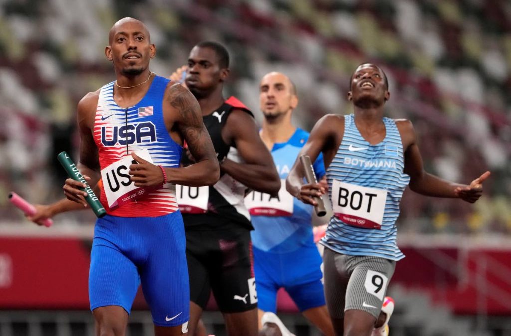 Trinidad and Tobago's Dwight St Hillaire (second from left) trails Vernon Norwood of the United States, during the semifinal of the men's 4x400-metre relay at the 2020 Summer Olympics, on Friday, in Tokyo, Japan. (AP PHOTO) - Trinidad and Tobago's Dwight St Hillaire (second from left) trails Vernon Norwood of the United States, during the semifinal of the men's 4x400-metre relay at the 2020 Summer Olympics, on Friday, in Tokyo, Japan. (AP PHOTO) -
