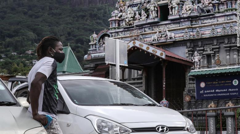 A man outside Arul Mihu Navasakthi Vinayagar Temple in Seychelles' capital Victoria on April 3, 2021. A man outside Arul Mihu Navasakthi Vinayagar Temple in Seychelles' capital Victoria on April 3, 2021.