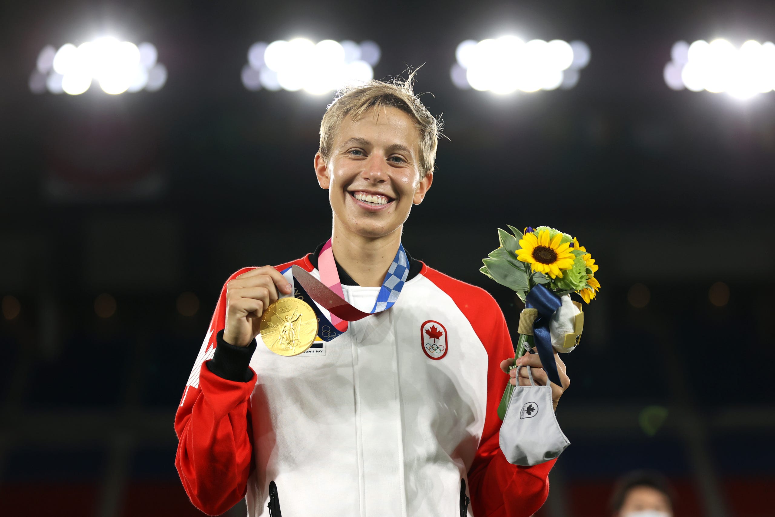 Canada midfielder Quinn on the podium after Canada won the gold medal at the Tokyo Olympics.   NAOMI BAKER, GETTY IMAGES Canada midfielder Quinn on the podium after Canada won the gold medal at the Tokyo Olympics.   NAOMI BAKER, GETTY IMAGES
