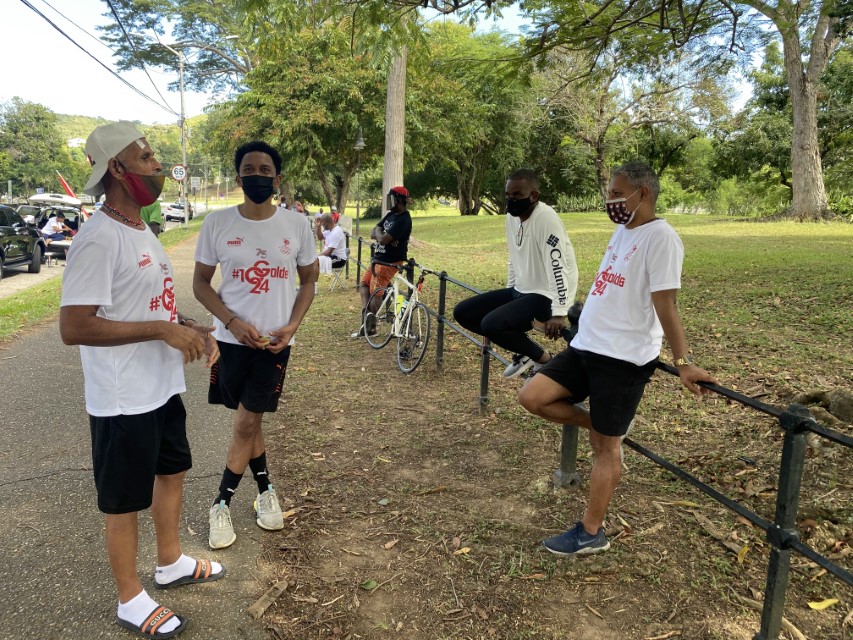 TTOC WALKERS: Minister of Agriculture, Land and Fisheries Clarence Rambharat, right, speaks with Trinidad and Tobago Olympic Committee president Brian Lewis, second from left, and Richie Rahim, the first walker to the finish, after Sunday’s 26.2 mile TTOC Marathon Walk that concluded in front of Whitehall at the Queen’s Park Savannah, Port of Spain. —Photo: Melanie Gulston/Team TTO Media TTOC WALKERS: Minister of Agriculture, Land and Fisheries Clarence Rambharat, right, speaks with Trinidad and Tobago Olympic Committee president Brian Lewis, second from left, and Richie Rahim, the first walker to the finish, after Sunday’s 26.2 mile TTOC Marathon Walk that concluded in front of Whitehall at the Queen’s Park Savannah, Port of Spain. —Photo: Melanie Gulston/Team TTO Media