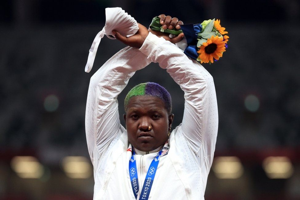 American Raven Saunders made this gesture on the medal podium after winning silver in the women's shot put American Raven Saunders made this gesture on the medal podium after winning silver in the women's shot put