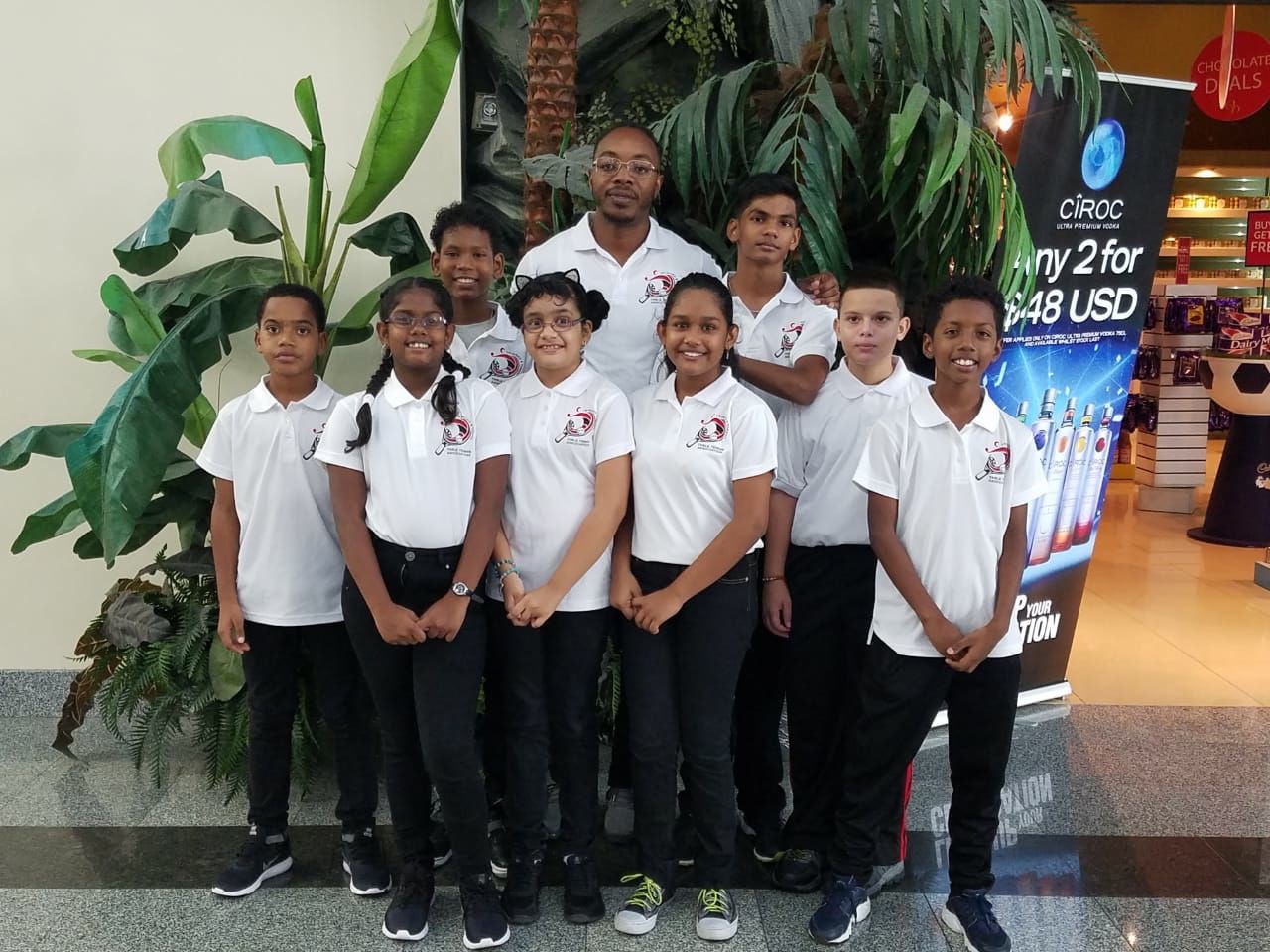 Coach Aaron Edwards, back-row centre, with members of the T&T Under-11 Boys’ and Girls; and Under-13 Boys’ teams prior to departure for the Caribbean Regional Table Tennis Federation Mini and Pre-Cadet Championship which serves today in Santo, Domingo. Coach Aaron Edwards, back-row centre, with members of the T&T Under-11 Boys’ and Girls; and Under-13 Boys’ teams prior to departure for the Caribbean Regional Table Tennis Federation Mini and Pre-Cadet Championship which serves today in Santo, Domingo.