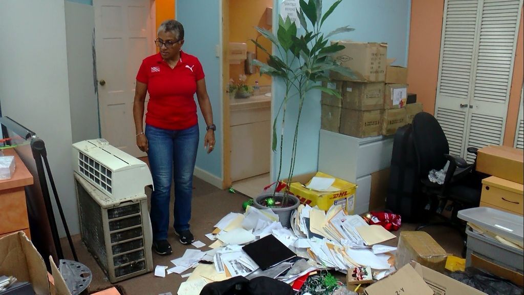 T&T Olympic Committee president Diane Henderson looks at the ransacked office at Olympic House on Abercrombie Street, Port-of-Spain, on Friday. (Image via: guardian.co.tt) T&T Olympic Committee president Diane Henderson looks at the ransacked office at Olympic House on Abercrombie Street, Port-of-Spain, on Friday. (Image via: guardian.co.tt)