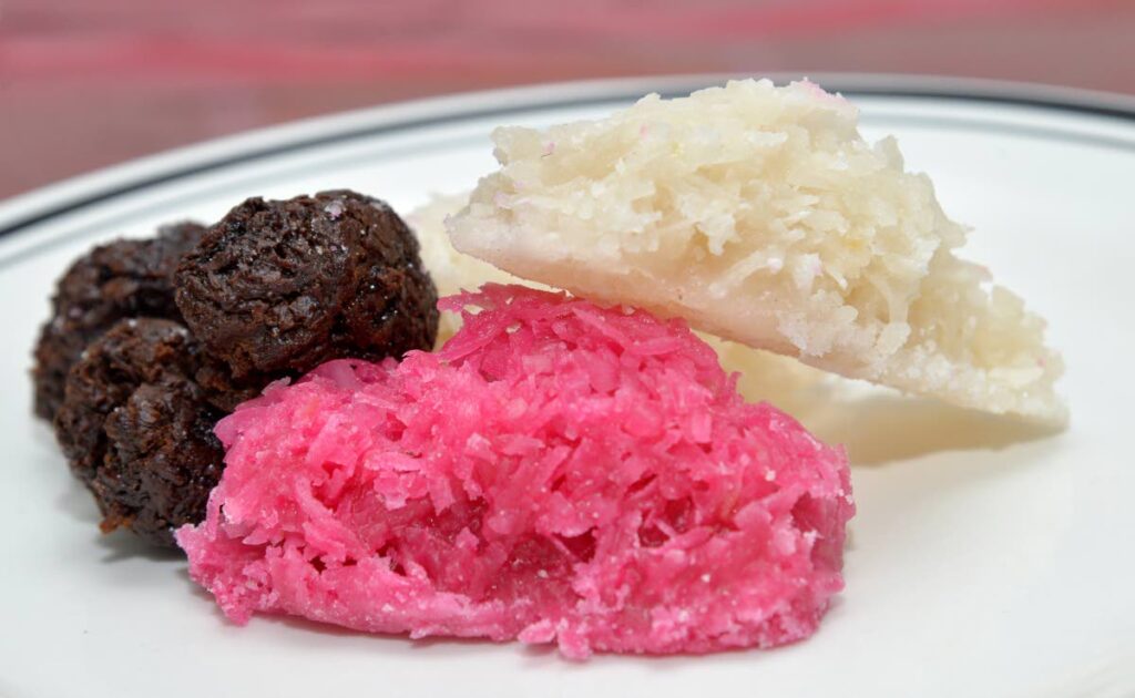 The sweets that have remained with us today were created in the African culinary custom are toolum – heavy with molasses, coconut and spices and the beloved sugar cake, both chip chip and grated - Anisto Alves (Image obtained at newsday.co.tt) The sweets that have remained with us today were created in the African culinary custom are toolum – heavy with molasses, coconut and spices and the beloved sugar cake, both chip chip and grated - Anisto Alves (Image obtained at newsday.co.tt)