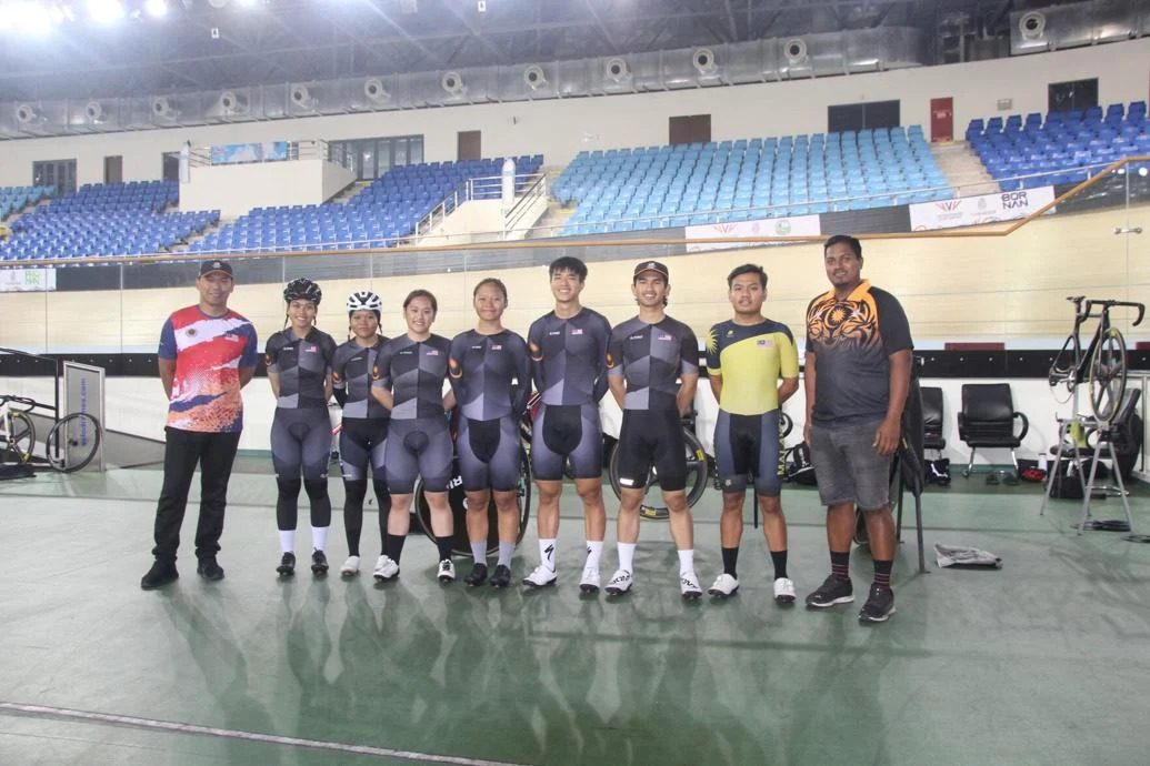 HAPPY VISITORS: Members of the Malaysian junior cycling team,  including coach Muhammad Zamani bin Mustarudin, right, at the National Cycling Velodrome, Couva, on Thursday. (Image obtained at trinidadexpress.com) HAPPY VISITORS: Members of the Malaysian junior cycling team,  including coach Muhammad Zamani bin Mustarudin, right, at the National Cycling Velodrome, Couva, on Thursday. (Image obtained at trinidadexpress.com)