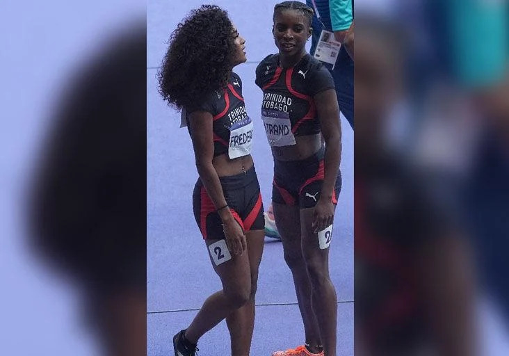 THE FUTURE: Young Trinidad and Tobago sprinters Sanaa Frederick, left, and Leah Bertrand, after the second Olympic Games women’s 4x100 metres qualifying round heat at the Stade de France, in Paris, on Thursday. The Team TTO quartet--Akilah Lewis, the Frederick twins, Sole and Sanaa, and Bertrand--clocked 43.99 seconds to finish eighth. They did not advance to the final. Bertrand was the T&T flagbearer at yesterday’s closing ceremony at Stade de France.  —Photo: BRENT STUBBS (Image obtained at trinidadexpress.com) THE FUTURE: Young Trinidad and Tobago sprinters Sanaa Frederick, left, and Leah Bertrand, after the second Olympic Games women’s 4x100 metres qualifying round heat at the Stade de France, in Paris, on Thursday. The Team TTO quartet--Akilah Lewis, the Frederick twins, Sole and Sanaa, and Bertrand--clocked 43.99 seconds to finish eighth. They did not advance to the final. Bertrand was the T&T flagbearer at yesterday’s closing ceremony at Stade de France.  —Photo: BRENT STUBBS (Image obtained at trinidadexpress.com)