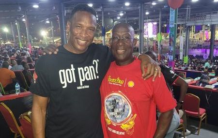T&T football legend Shaka Hislop with Prime Minister Dr Keith Rowley at Panorama finals on Saturday night. (Photo credit - Pan Trinbago) (Image obtained at tt.loopnews.com)