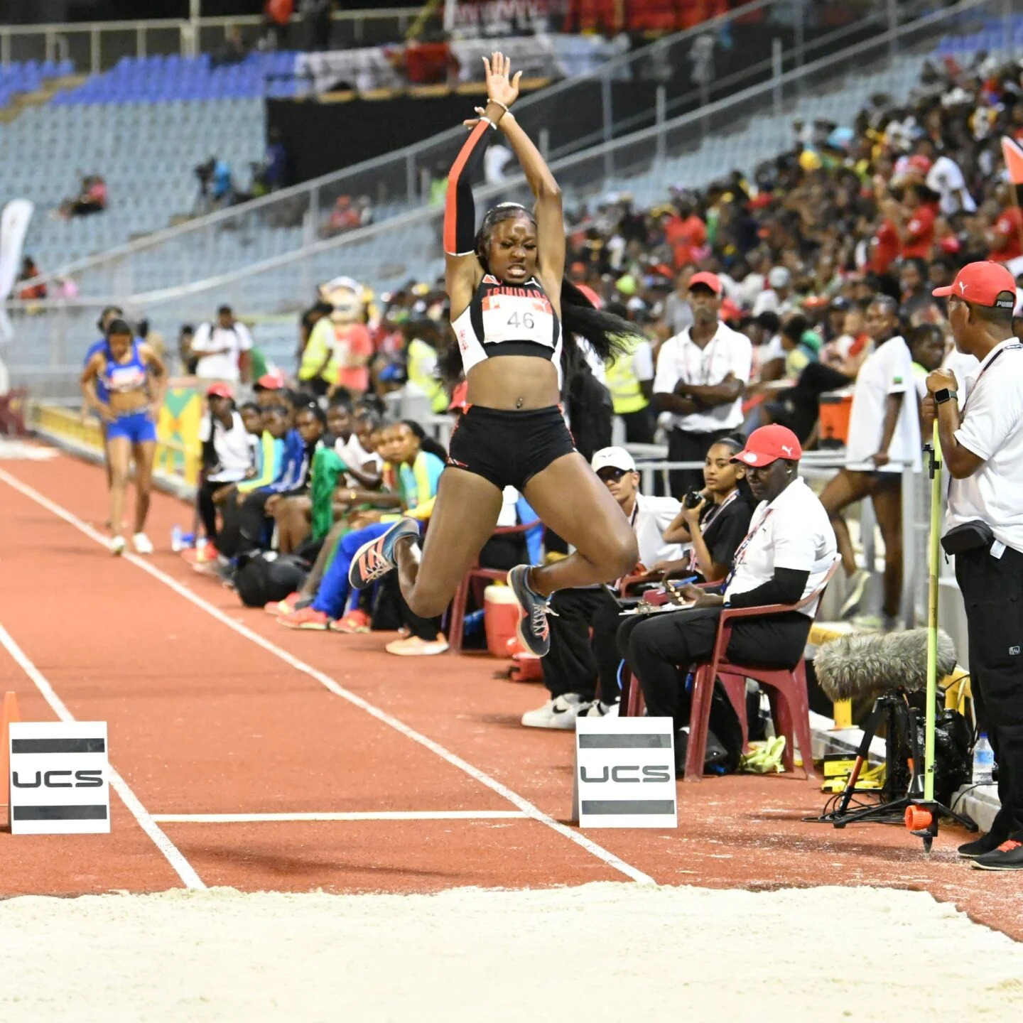 CHAMPION: Gianna Paul leaps to Carifta Games girls' under-20 gold at the Hasely Crawford Stadium, in Port of Spain, tonight. Paul won with a 6.48 metres leap, with second spot going to her Trinidad and Tobago teammate Janae De Gannes (6.36m). --Photo: ISHMAEL SALANDY (Image obtained at newsday.co.tt)