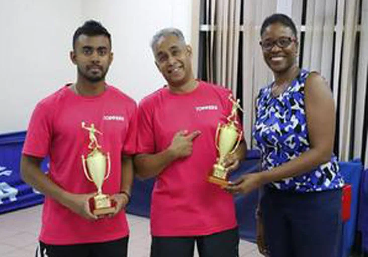 FLASHBACK: Men’s doubles champions Arun Roopnarine, left, and Reeza Burke, centre, with Trinidad and Tobago Table Tennis Association president, Dr Shellyann Wilson, in August 2023. (Image obtained at trinidadexpress.com)